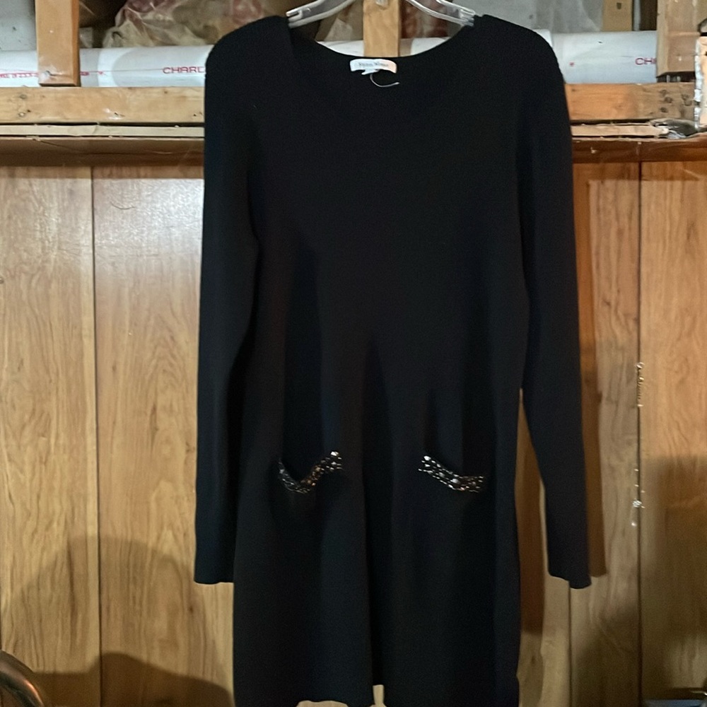 Never worn two front pockets extra long